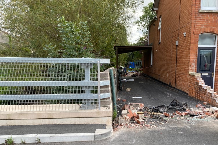 Damage visible to one property appeared to show the truck had been driven out from a garden, taking some of the building with it