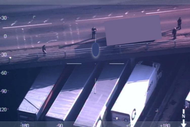 A 41-year-old man remains in police custody after using a military vehicle to ram police cars