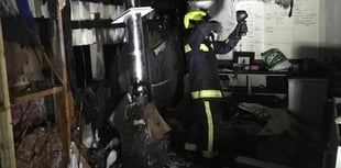 Firefighters battle outbuilding blaze