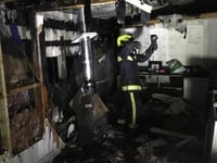 Firefighters battle outbuilding blaze