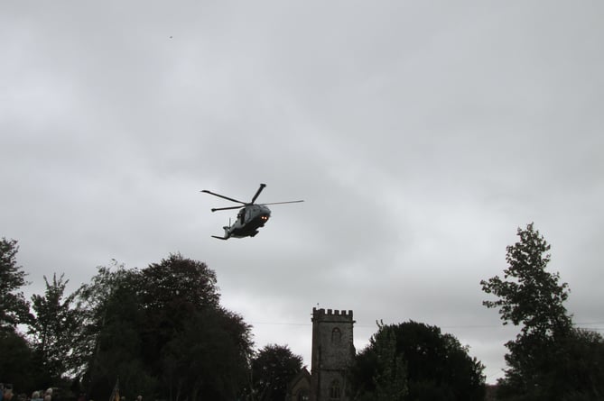 A Merlin helicopter from RNAS Yeovilton performed a fly-past at the end of the memorial ceremony.