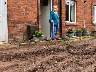Floods leave resident 'trapped by mudslide'