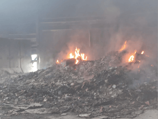 Fires continue to burn in devastated recycling centre