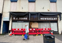 'Pedestrian near miss' after window falls from former newsagents 