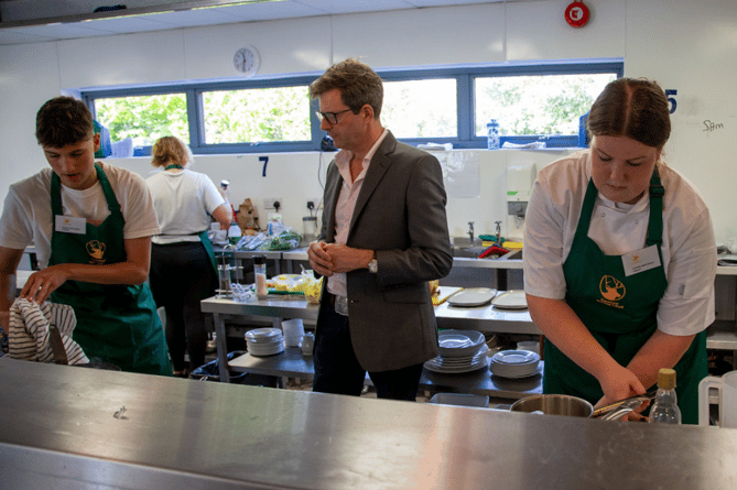 Master Chef judge William Sitwell inspects some of the work of this year's Exmoor Young Chef of the Year finalists