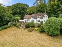Hillside cottage for sale is "nature lover's paradise" 
