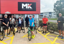 Charity ride former MD calls in at Wellington firm