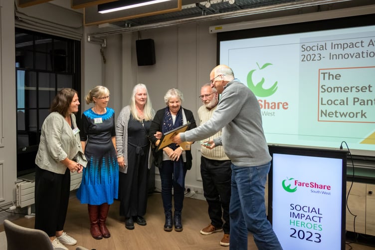 Somerset Local Pantry Network members accepting FareShare South West’s social impact award are (from left) Ali Sanderson (Minehead), Helen Philips (Somerset Council), Sharyn Greaves, Val Harris and Lewis Hayes (East Bridgwater), with FareShare South West trustees chairman Andy Street.