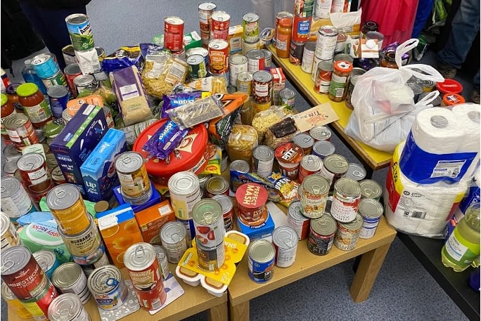 Some of the food items collected in Rockwell Green during Halloween by Living Light Church members.