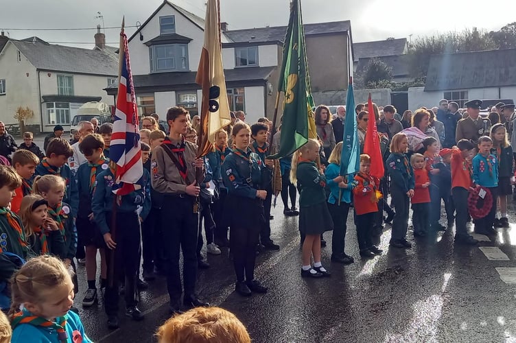 Crowds attended a Remembrance Sunday service around Hemyock war Memorial.