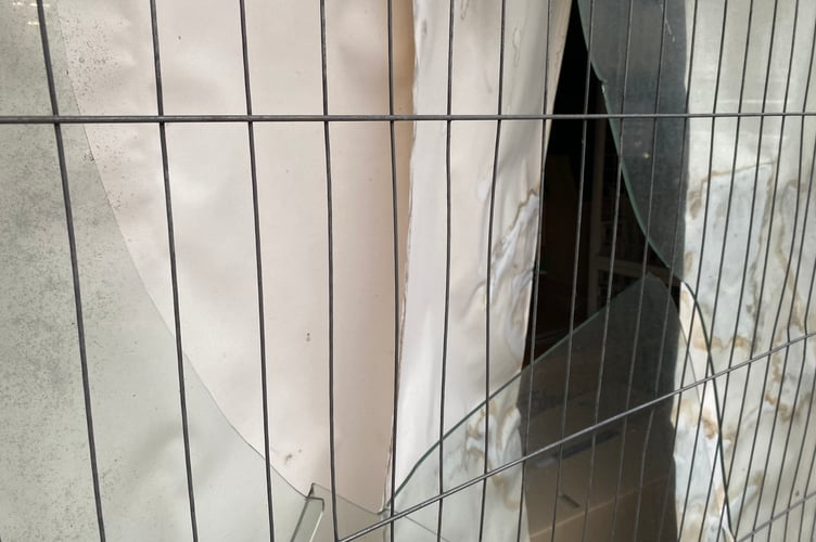 E J Tear's front window was seen smashed on Tuesday morning