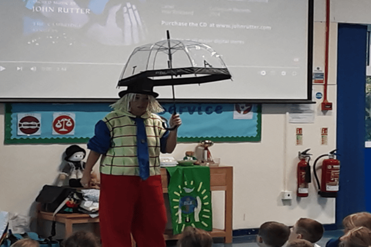 Rockwell Green Primary School pupils meet Archie to learn about dementia.