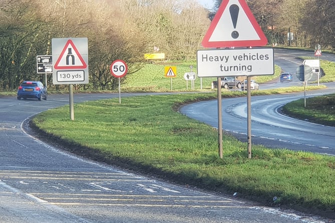 New signs at the start of a 50 mph zone on the A38 at the top of White Ball Hill.