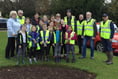 Pupils plant a purple welcome for spring