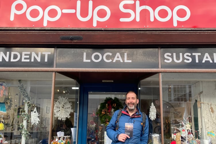 Steve Parkin outside pop-up shop with his new book.