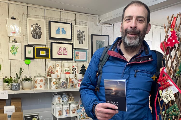 Steve Parkin inside pop-up shop with his new book.
