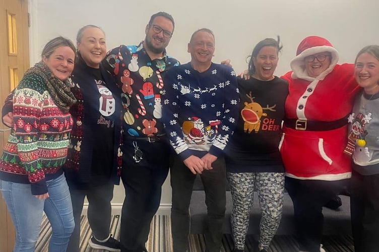 Staff from Bluebird Care Wellington who took part in a Christmas jumper charity day.
