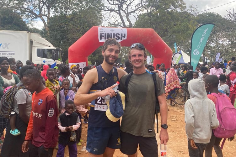 Seb (left) after running Mr Mulanje Porters Race in Malawi.