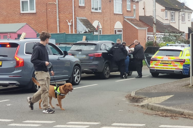 Police question a motorist in Olands Road, Wellington.