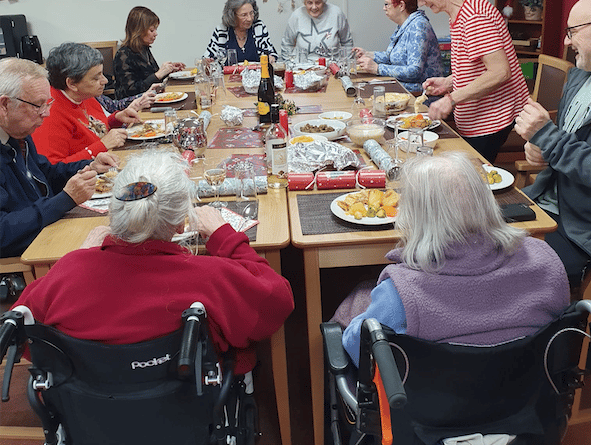 Residents of Abbeyfield Society's Old Vicarage, Wellington, enjoy their Christmas dinner.