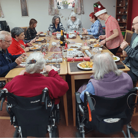 Residents of Abbeyfield Society's Old Vicarage, Wellington, enjoy their Christmas dinner.