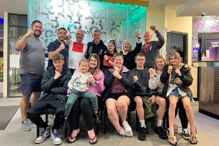 Danny Wyatt (back row, centre) with 'Team Danny' family members before he underwent an operation to remove a brain tumour.