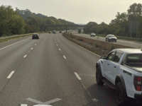 Woman charged after three injured in M5 smash