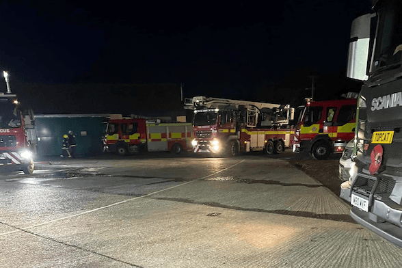 Some of the 11 fire engines sent to a commercial property blaze in Uffculme.