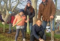 Headmaster joins Wellington pupils to help  plant hundreds of trees 