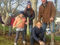 Headmaster joins Wellington pupils to help  plant hundreds of trees 