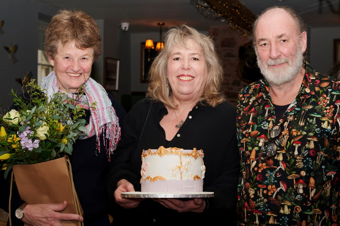 Alison (centre) was given a send off by locals after stepping away from the Carousel Pig after more than three decades