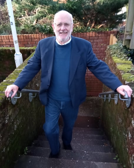 Wellington town Cllr Mike McGuffie, who is the local Labour Party secretary, with new handrails for which he campaigned to help elderly people use steps from Alexandra Road into Longforth Road car park.