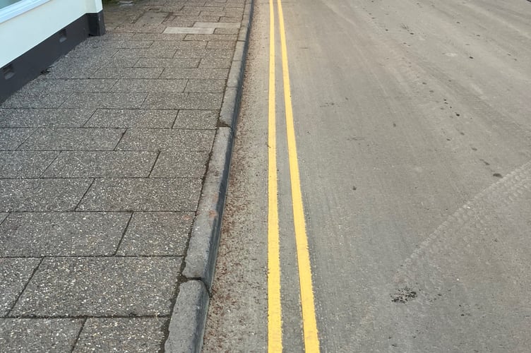Double yellow lines have had to be repainted to the correct width in Wiveliscombe.