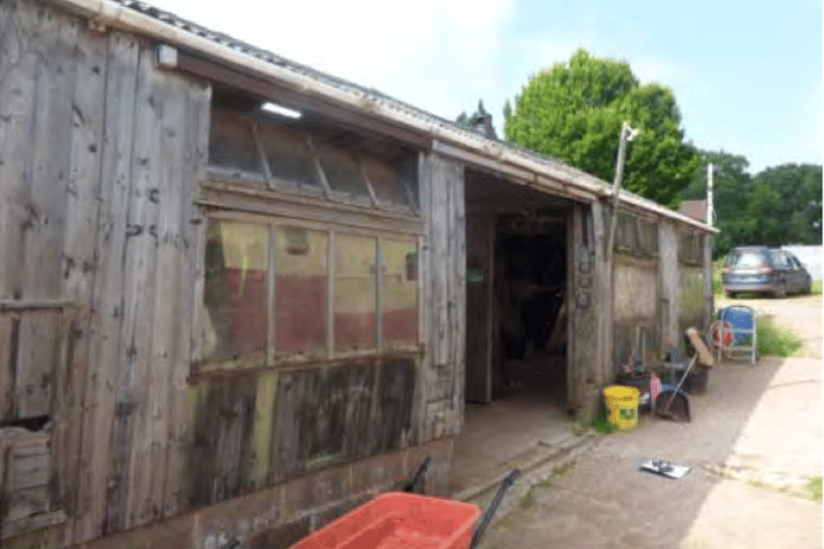 The front of a barn Alvin Bellamy wants to convert to a bungalow near Langford Budville.