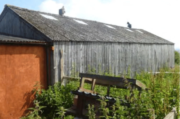 A view of the rear of a barn Alvin Bellamy wants to convert to a bungalow near Langford Budville.