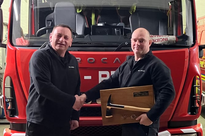 Wiveliscombe Fire Station crew manager Neil Higgins (right) who has left after 24 years of service.