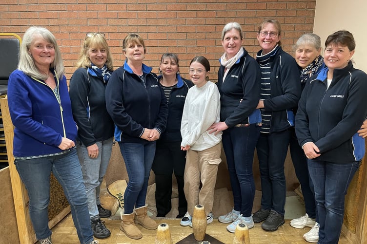 Land Girls: l-r - Annie Symons, Heather Kynaston, Suzette Williams, Kristy Popplestone, Isabella,Tina Coles, Anna Price, Kath Rose and Carol Gamlin