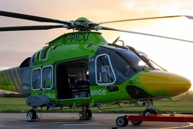 Air ambulance crews are taking to the sky in a green helicopter while their usual yellow chopper undergoes maintenance