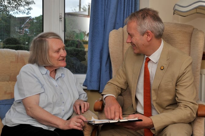 Gideon Amos chats with local pensioner Janet Fulljames.