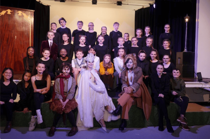 The main cast of Court Fields School's production of The Lion, the Witch, and the Wardrobe.