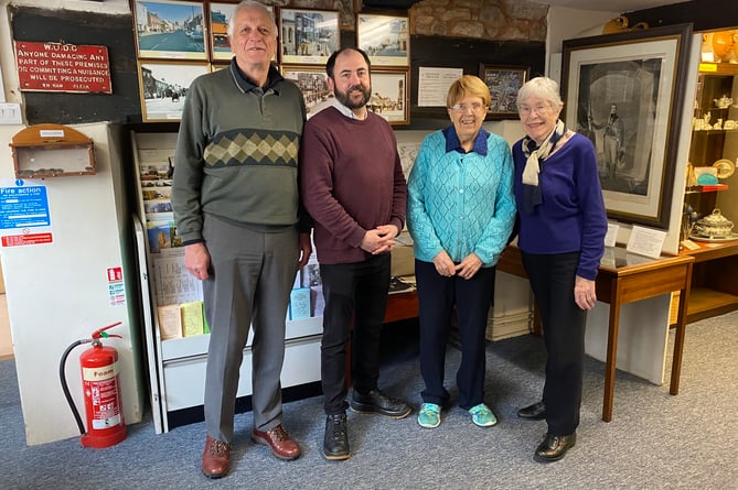 Volunteers Colin Spackman, Lesley Darlow and Carole Moor with David Shepherd, editor of the Wellington Weekly (second from left)