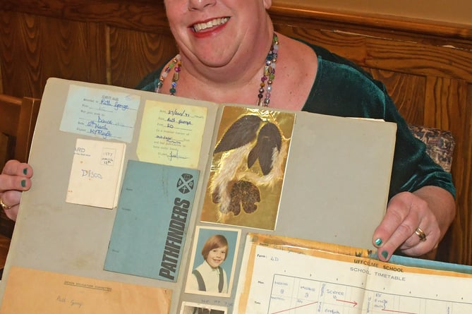 Ruth Hill, who helped organise the event, and her scrapbook of years gone by