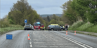 Driver trapped as car rolls over on A38