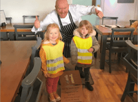 Children visit as popular village cafe reopens 