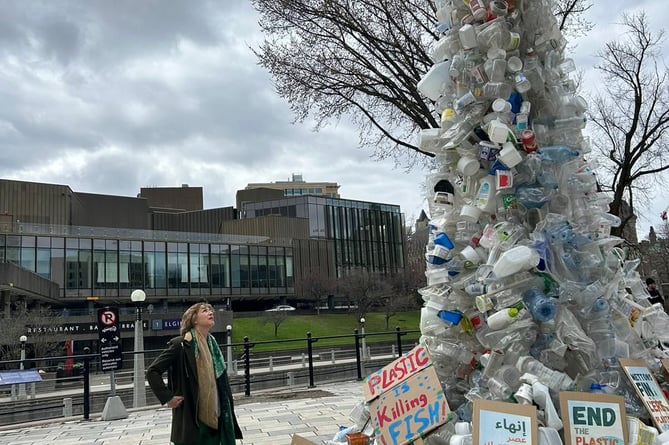 Local MP Rebecca Pow was dwarfed by a monster pile of plastic when she attended talks on an international pollution treaty.