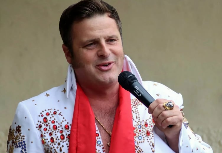 Stuart Horne performing as Elvis at one of the summer concerts in Wellington Park last year.