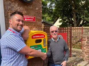 Community's successful crowdfunded for defibrillator  