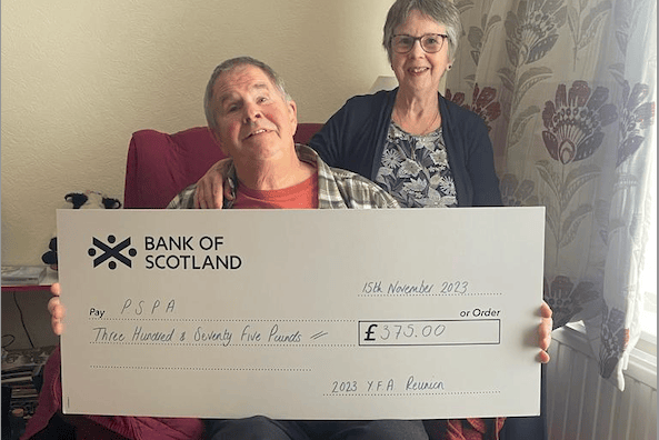Tony and Chris Walkers with a YFC cheque for £375 for the PSPA.