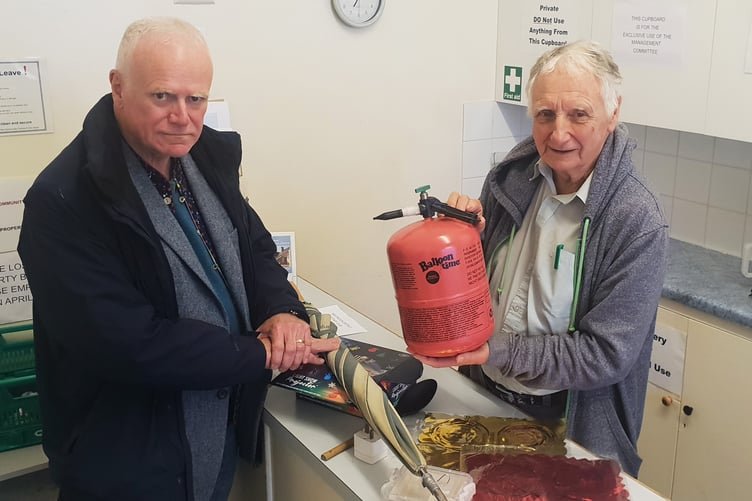 Wellington Community Centre committee chairman Dave Mitton (right) with town council representative Cllr Mark Lithgow and items of lost property.