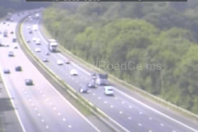 Traffic has now cleared after an overturned car resulted in two people being taken to hospital and extensive tailbacks